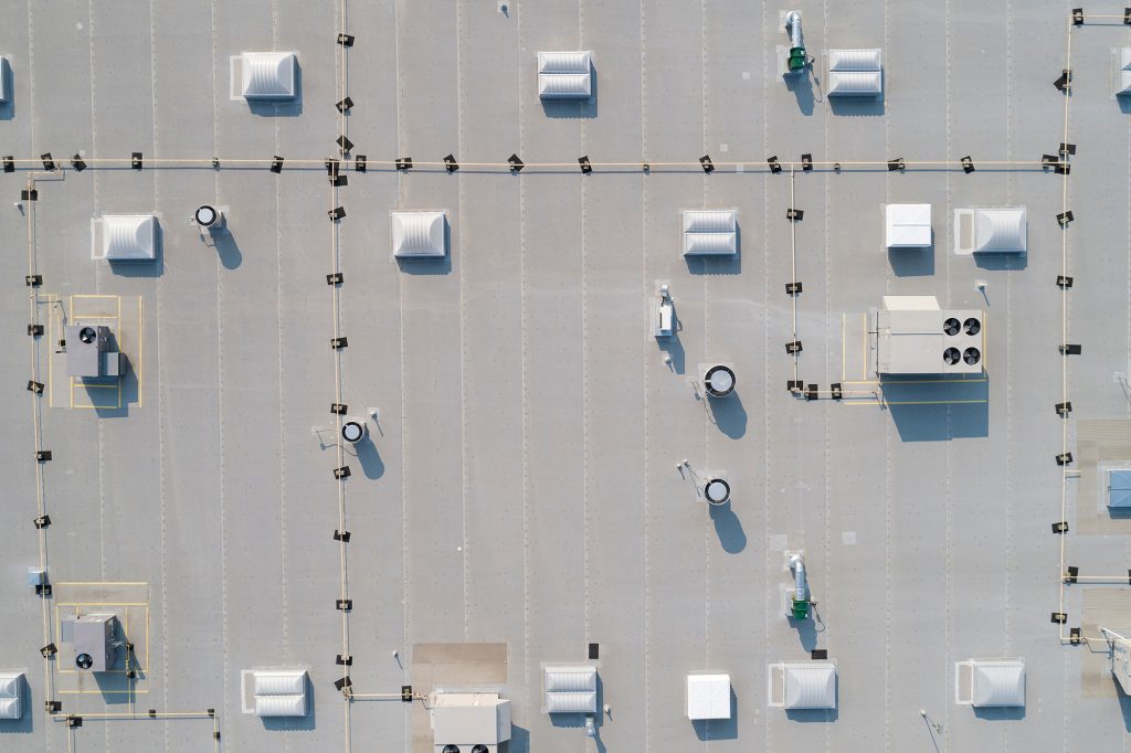 Flat Roof vs. Sloped Roof for Commercial Buildings in Columbia, MD